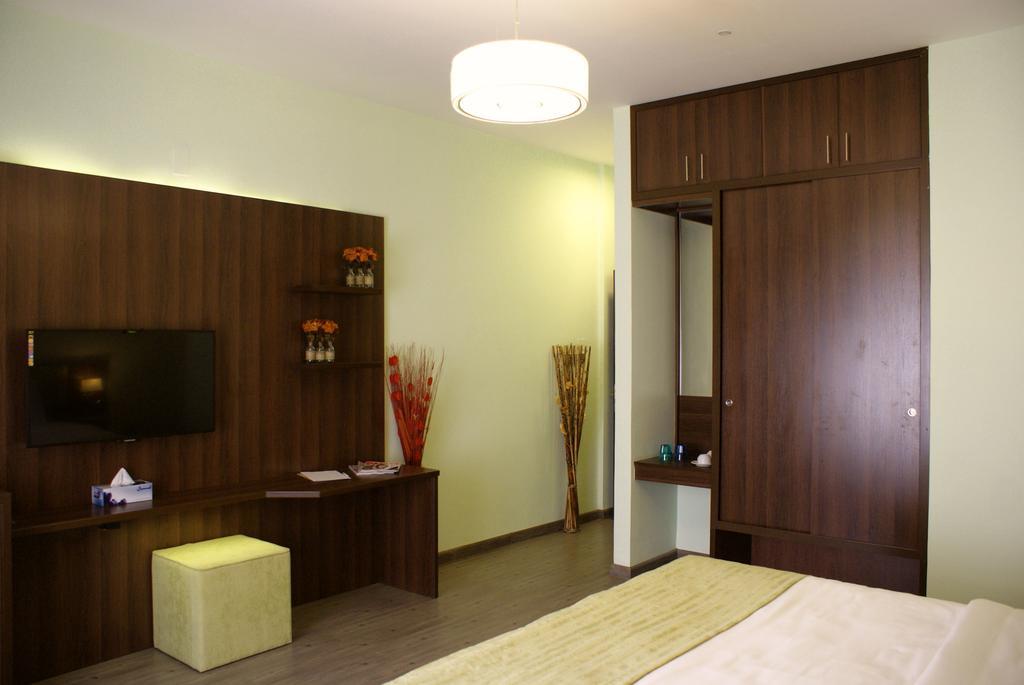 Weekend Hotel & Apartments Muscat Phòng bức ảnh